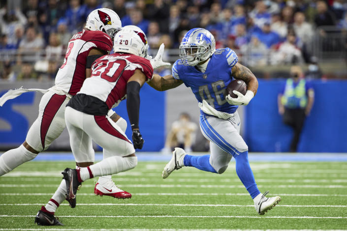 Detroit Lions running back Craig Reynolds (46) rushes against the Arizona Cardinals during an NFL football game, Sunday, Dec. 19, 2021, in Detroit. (AP Photo/Rick Osentoski)